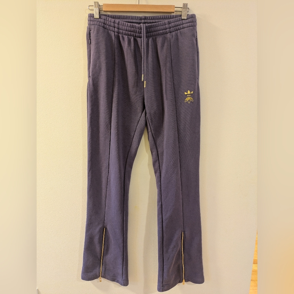 Adidas Purple Track Pants with Gold Logo, Size M.